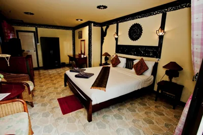 Queen-rum med balkong — Paradise Pearl Bungalows